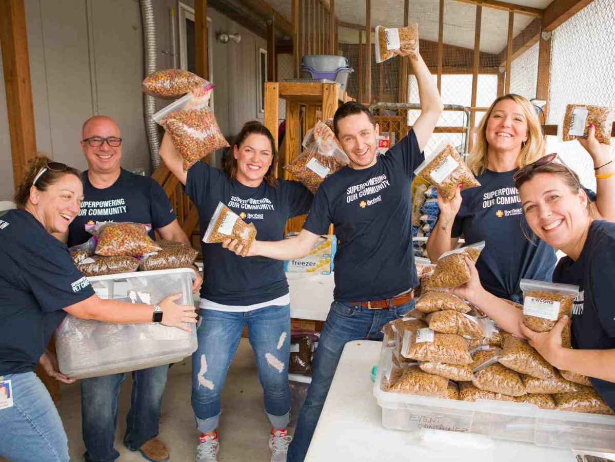 Banfield volunteer participating in a community wellness event