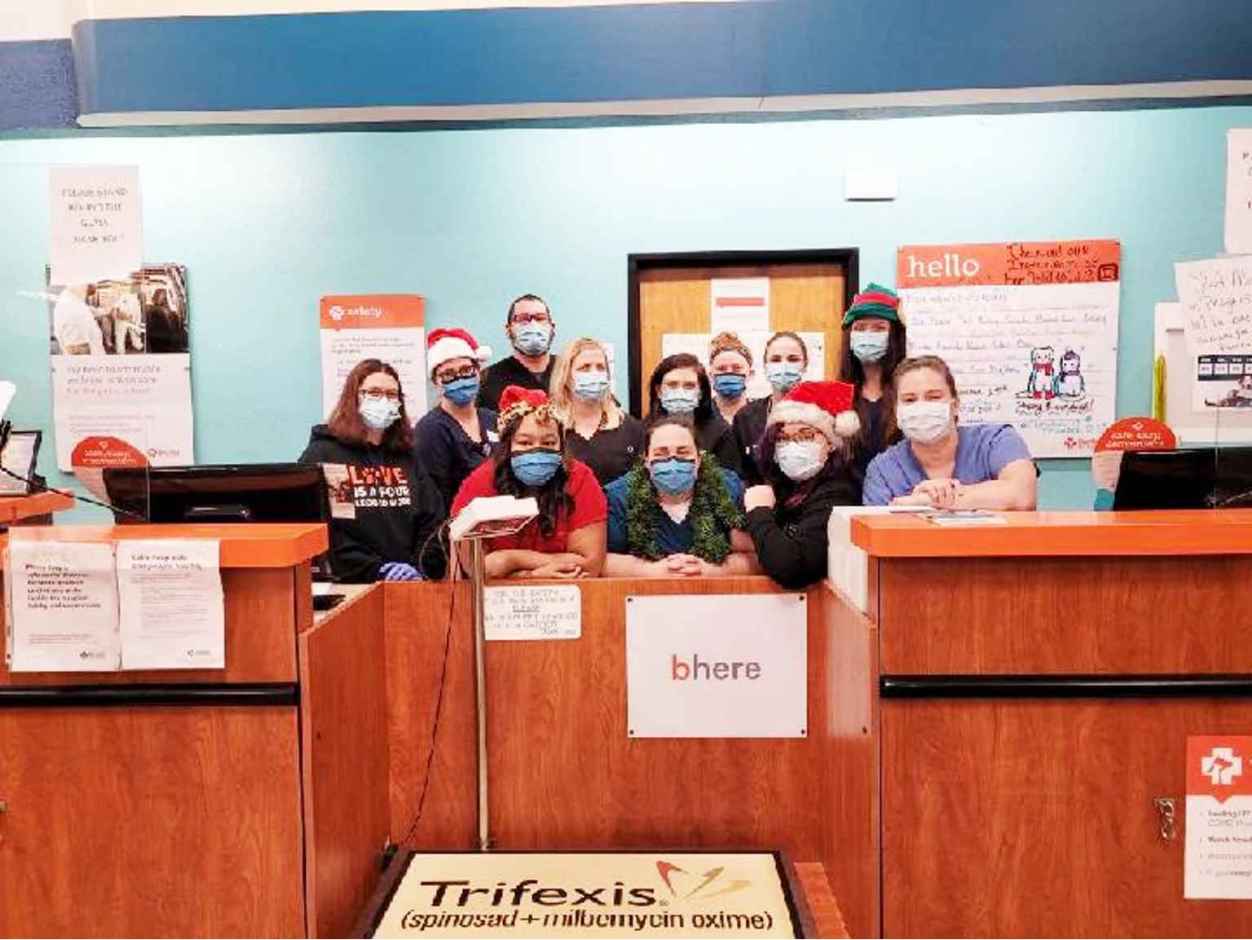 A group of Banfield Associates celebrating Christmas at the Banfield Pet Hospital